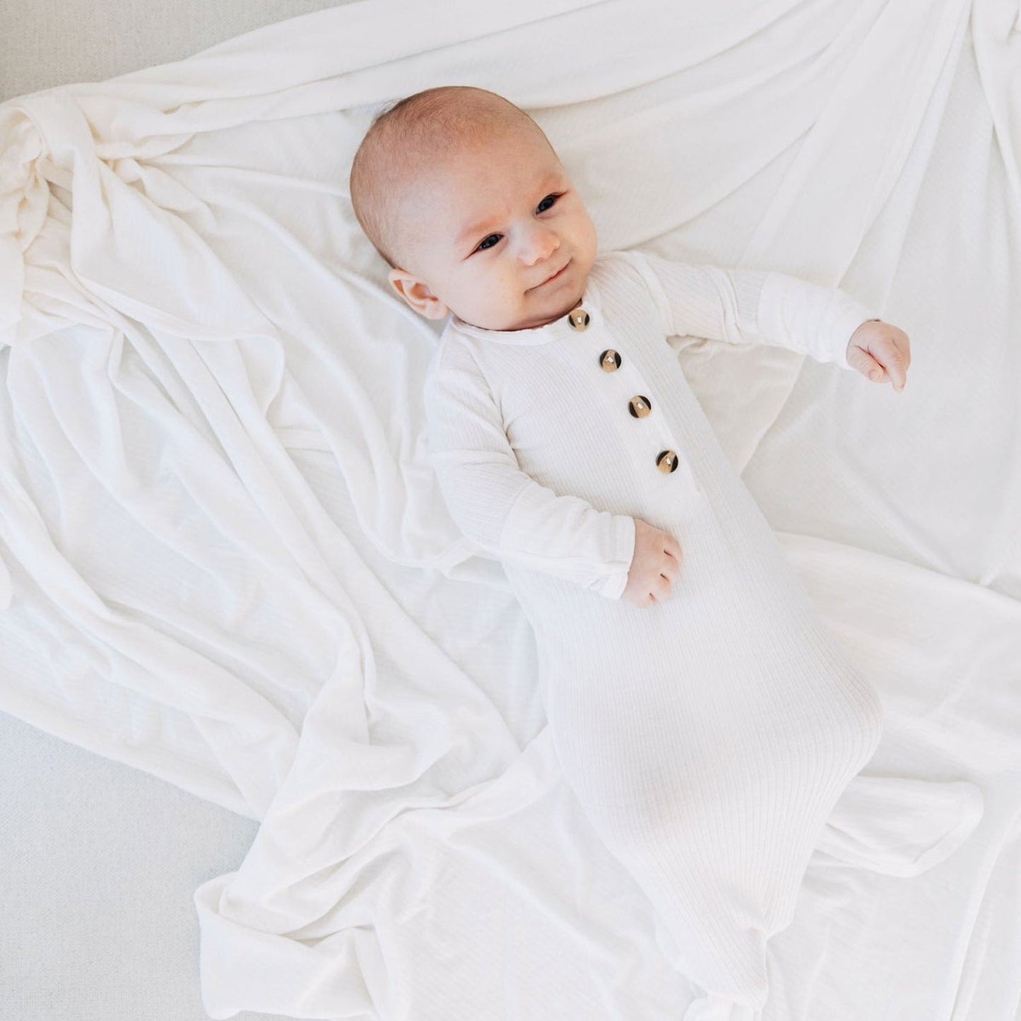 Baby wearing Lou Lou and Company Ribbed Knotted Gown - Wren