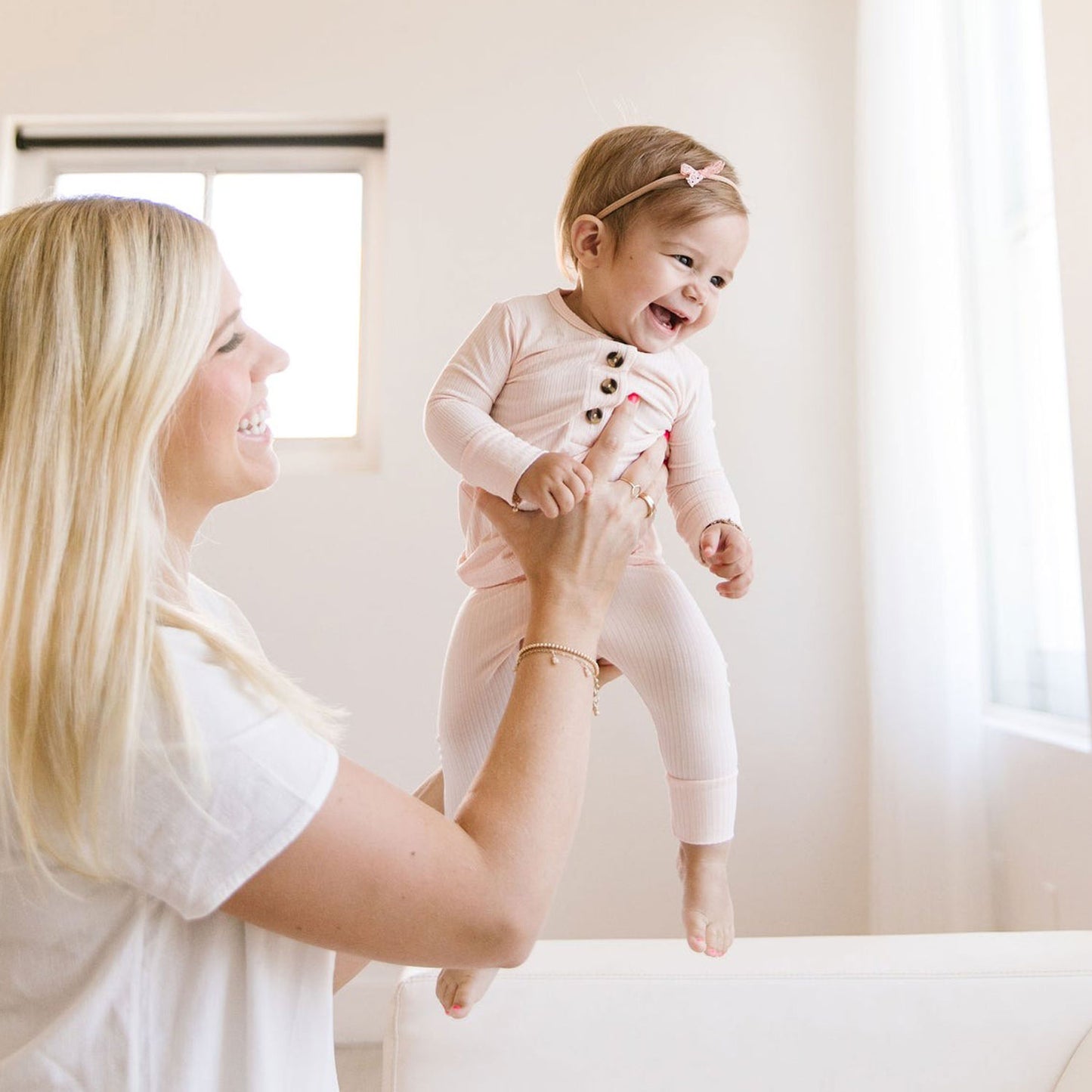 Mom holds toddler wearing Lou Lou and Company Ribbed Top and Bottoms - Rosie