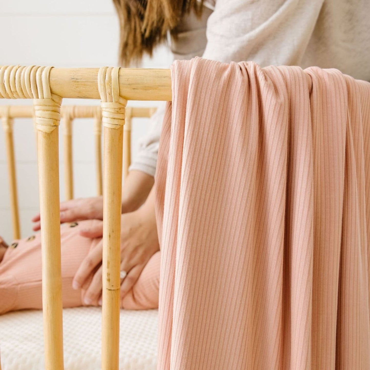 Baby in crib wearing Lou Lou and Company Ribbed Knotted Gown - Audrey