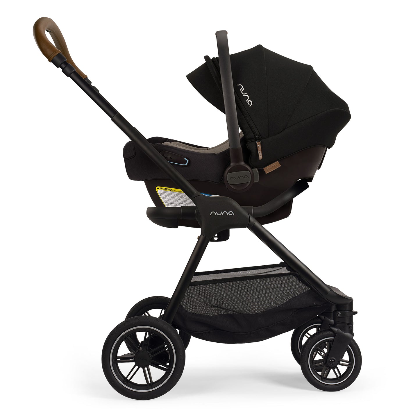 Nuna PIPA Aire Infant Car Seat with Base - Caviar attached to Nuna TRIV Next stroller