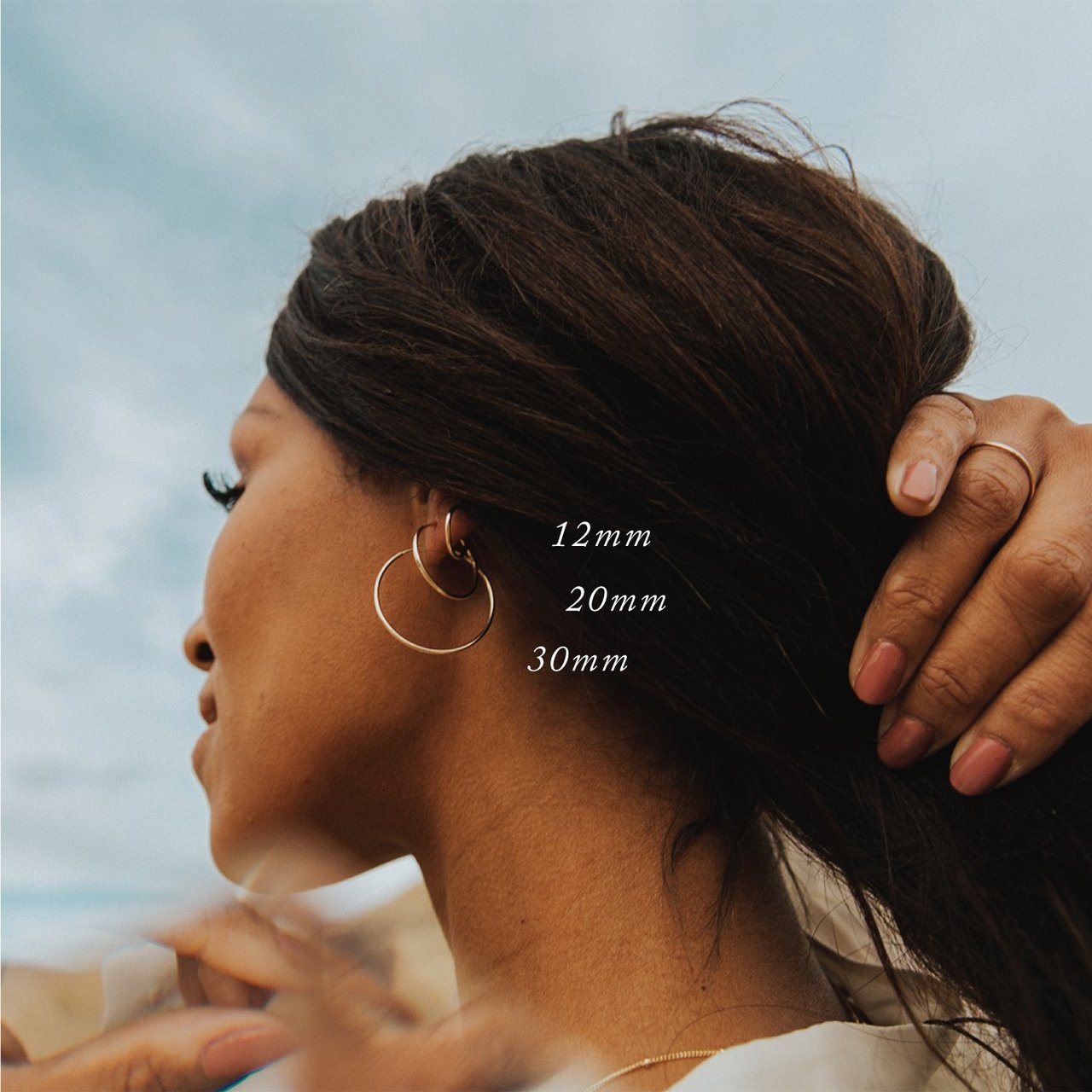 Woman Wearing Made by Mary Gold Filled Live In Hoop Earrings