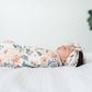 Swaddled baby sleeps while wearing Copper Pearl Knit Headband Bow - Autumn