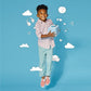 Child holding Tonies Toniebox Starter Set - Light Blue (Playtime Puppy)