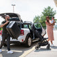 Couple at airport unloads Nuna TRVL Stroller