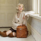 Woman sitting with Azaria La Mere Petite - Maple
