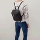 Woman Wearing Hobo Bags River Backpack - Velvet Pebbled Hide - Black