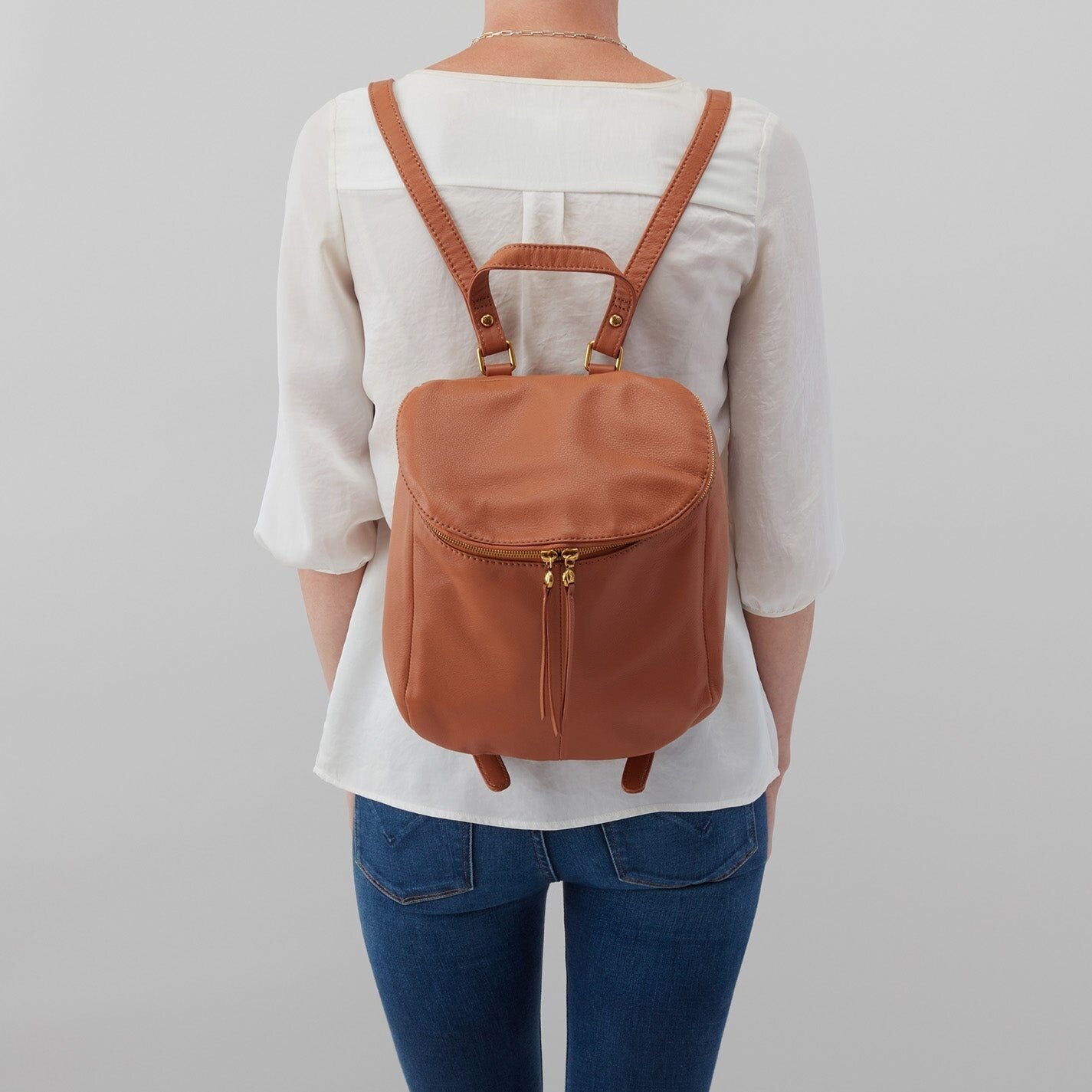 Woman Wearing Hobo Bags River Backpack - Velvet Pebbled Hide - Cashew