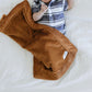 Baby sleeping with Saranoni Mini Lush Blanket - Camel