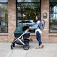 Woman pushing stroller with UPPAbaby PiggyBack - VISTA