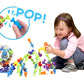 Child Playing with Fat Brain Toys Squigz Deluxe Toy Set
