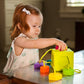 Child Playing with Fat Brain Toys OombeeCube