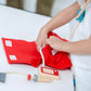 Child Playing with PlanToys Doctor Set