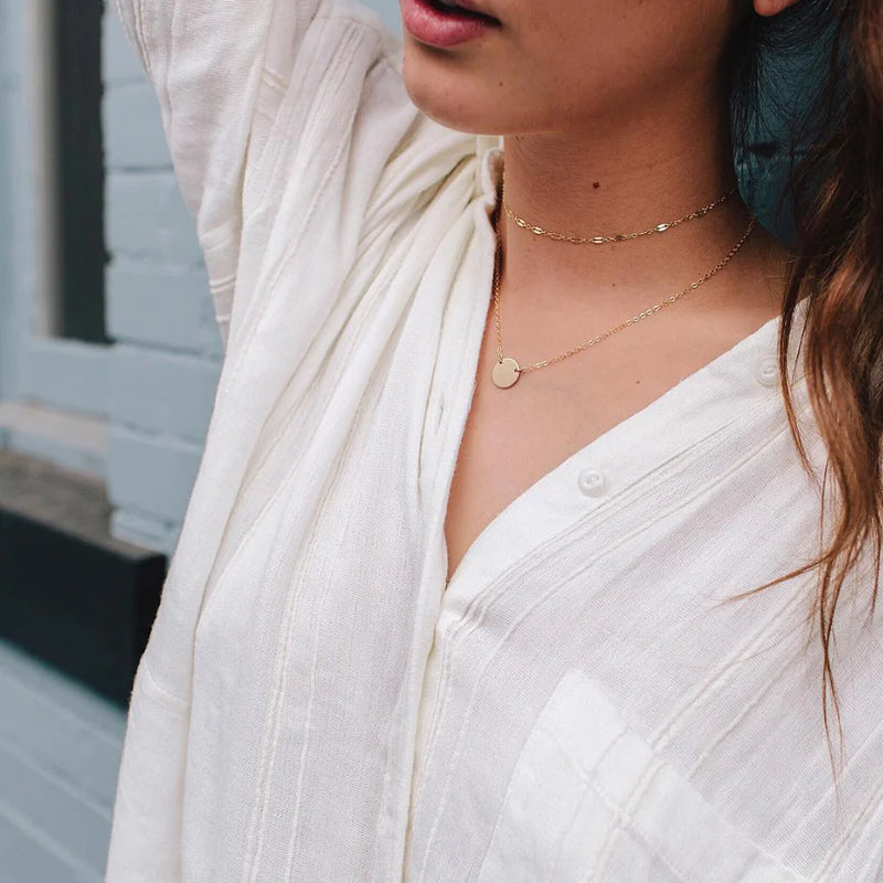 Woman Wearing Made by Mary Gold Filled Mini Zola Disc Necklace - April / Daisy